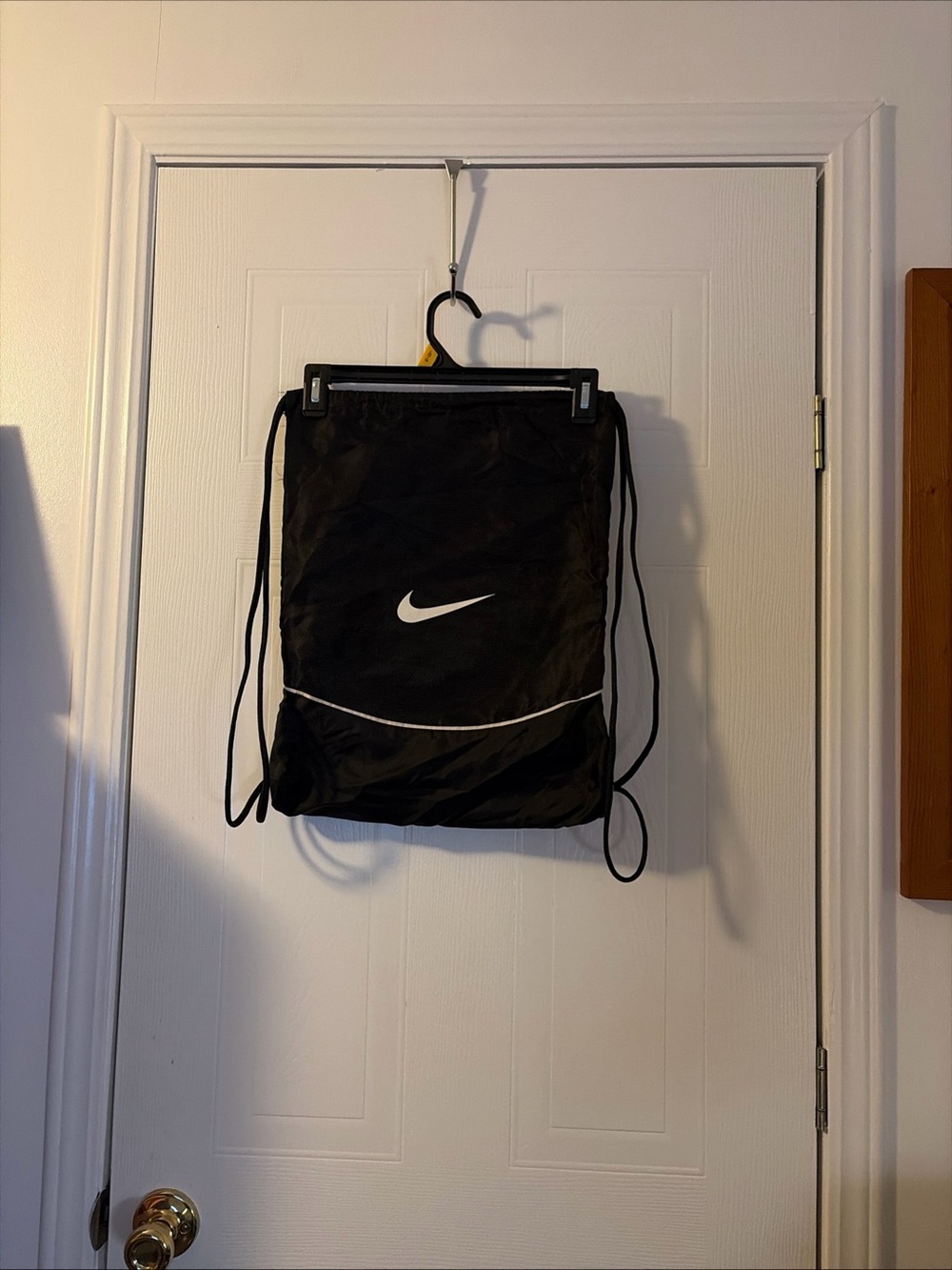 Nike Brasilia Training Gymsack Drawstring Bag Black with a White Swoosh logo